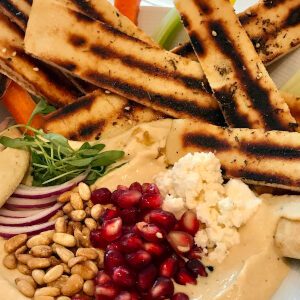 Mixed meze platter with pine nuts and pomegranate