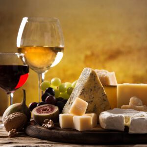Two Glasses of Wine and a Cheese Platter